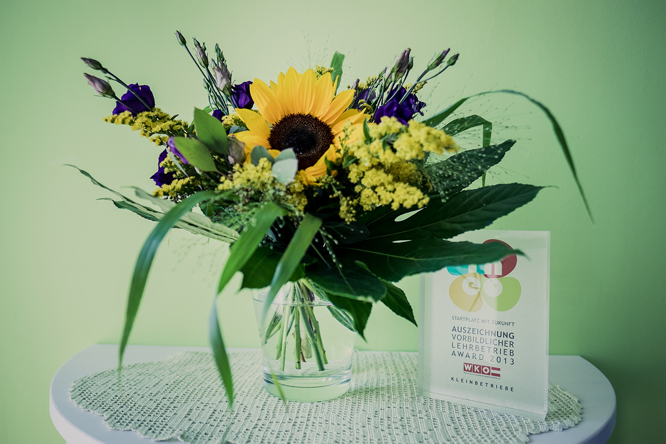 Blumen und Auszeichnung